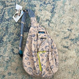 Kavu Seashell Print Backpack in Beige and Blue